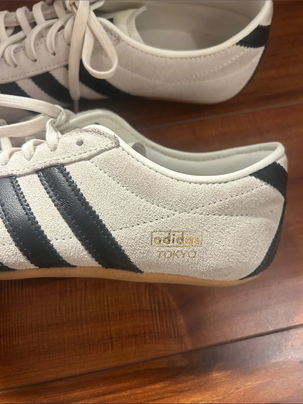 Adidas Women’s Off-White Suede Sneakers with Black Stripes